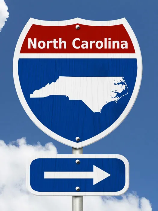 Sign with North Carolina and Arrow to the right
