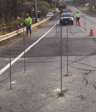 Cracked roadway with URETEK Deep Injection tube array